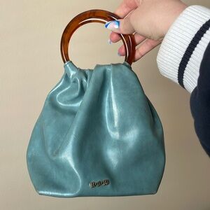 House of Want cadet blue ring top handle bag